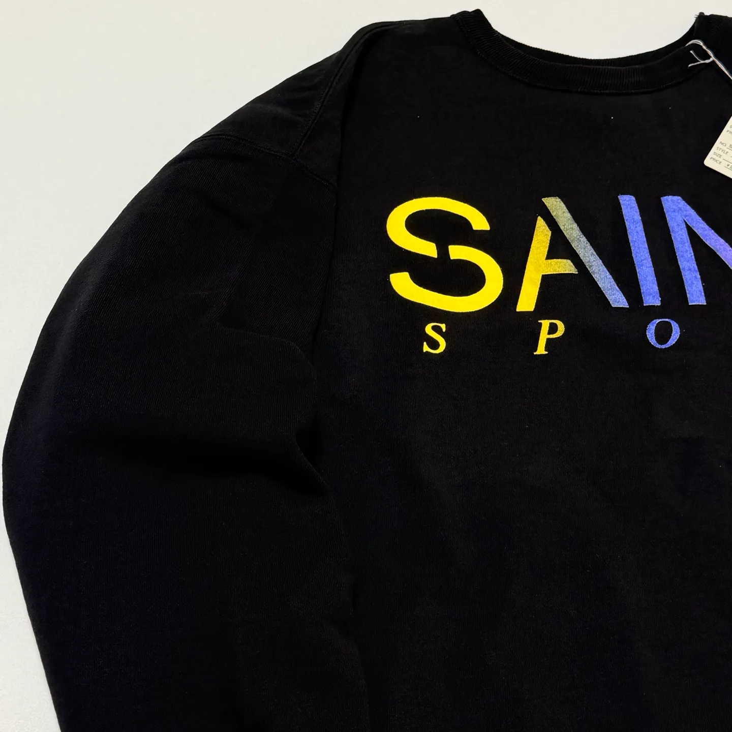 SAINT Mxxxxxx CRW NECK SWET/SAINT SPORT/BLK Colorful Gradient SAINT Round Neck Sweatshirt Black S-XL Original 420g David's Cloth Light Fleece Genuine Plate Main Mark Washing Mark and Other Accessories Complete and Correct Correct Level of Printing Technology Natural Gradient Transition Original Loose Fit Comfortable and Easy to Wear